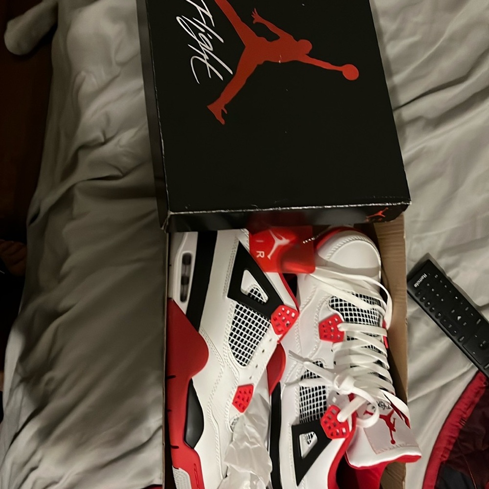 Jordan retro4 brand new in the original box white red and black